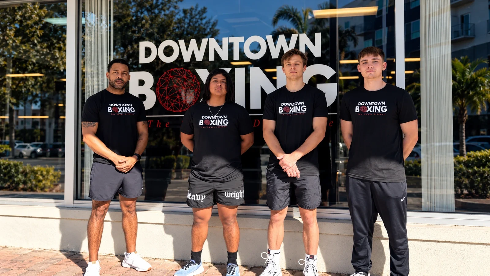 Downtown Boxing coaches in front of the gym
